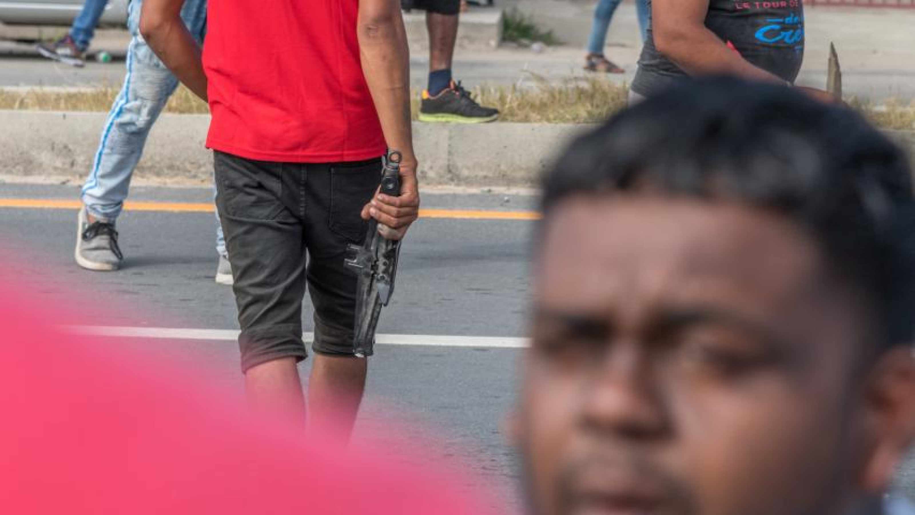 Some of the angry protesters were also armed.