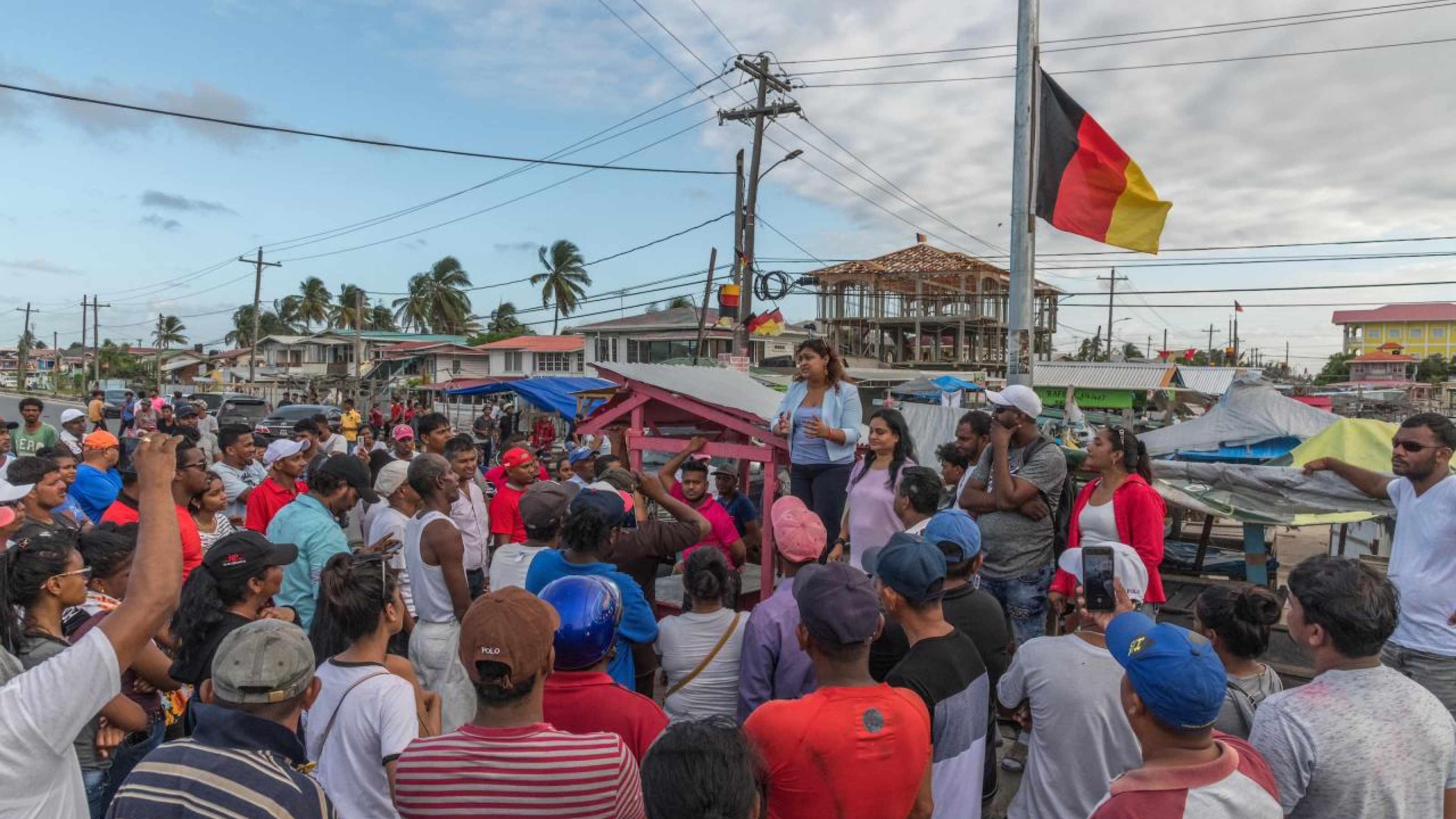A PPP minister delivers a rousing and scathing speech during the protests against the government party.